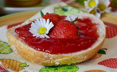 chamomile with jam and strawberries